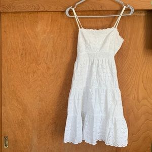 Short, White dress. Strong material. Small